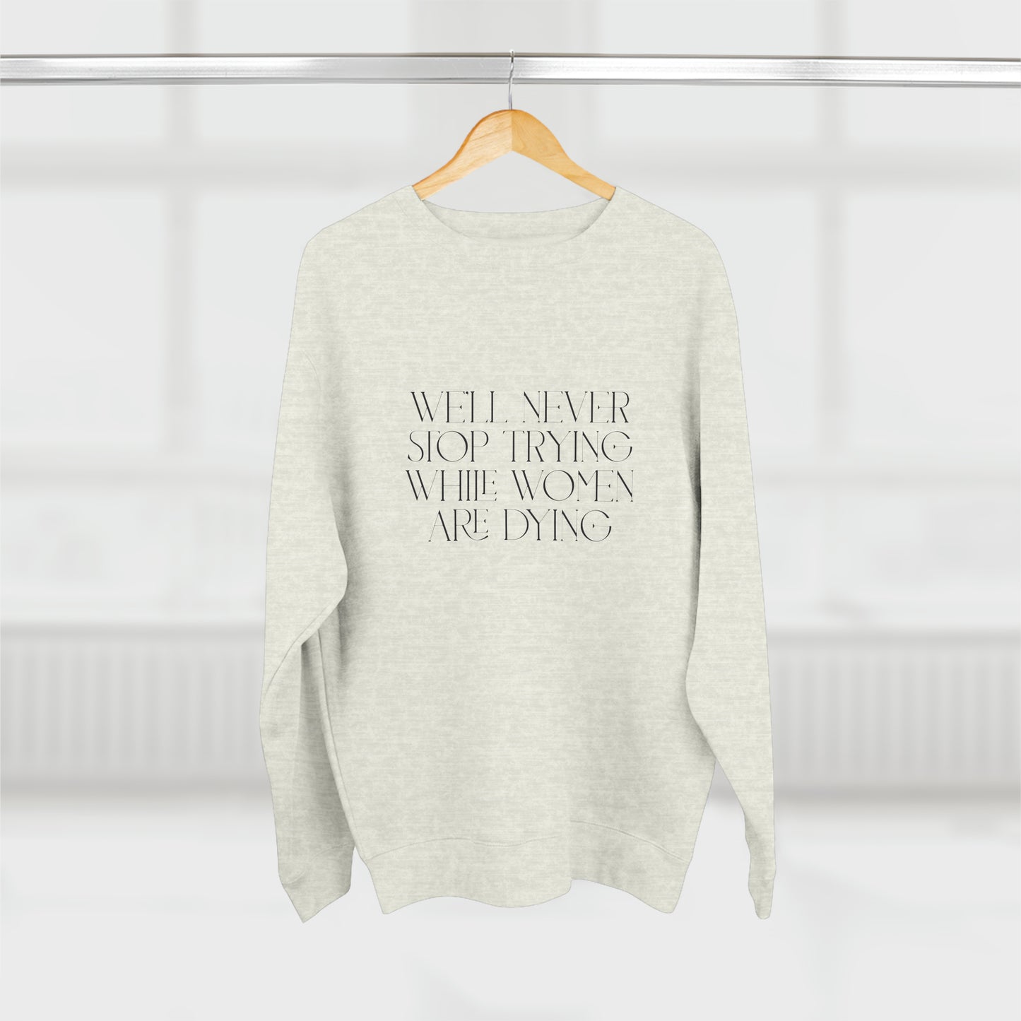 "We'll never stop trying" - Unisex Premium Crewneck Sweatshirt